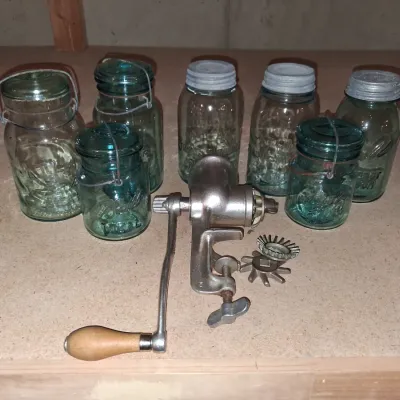 AQUA BLUE CANNING JARS WITH ZINC AND WIRE BALE LIDS PLUS A FOOD CHOPPER