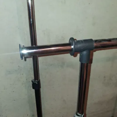 2 ADJUSTABLE GARMENT RACKS ON WHEELS