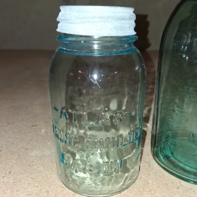 AQUA BLUE CANNING JARS WITH ZINC AND WIRE BALE LIDS