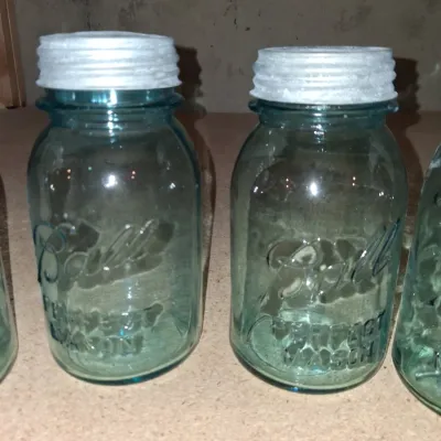 AQUA BLUE CANNING JARS WITH ZINC LIDS PLUS A FOOD CHOPPER