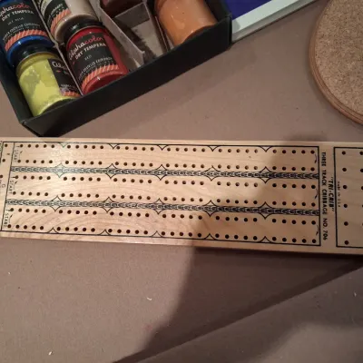 BANBALL GAME, PAINTING SUPPLIES AND A CRIBBAGE BOARD