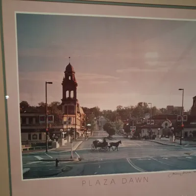 LEATHER SUITCASE AND SIGNED POSTER "PLAZA DAWN"