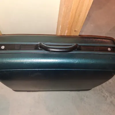 SAMSONITE HARD SIDED SUITCASE ON 4 WHEELS AND A SAMSONITE GARMENT BAG