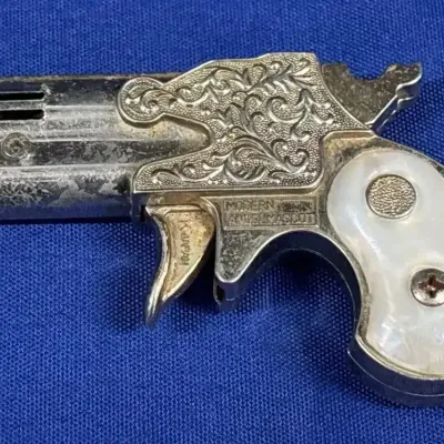 Vintage Modern Angel Mascot Derringer Pistol Pocket Lighter - Retro, Novelty