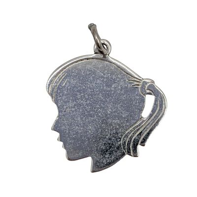 Sale Photo Thumbnail #395: Sterling Silver Inscribed Silhouette Head Charm