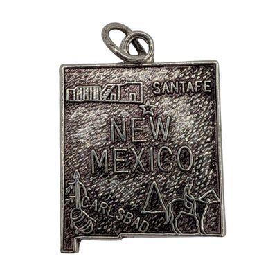 Sale Photo Thumbnail #441: Sterling Silver New Mexico State Charm