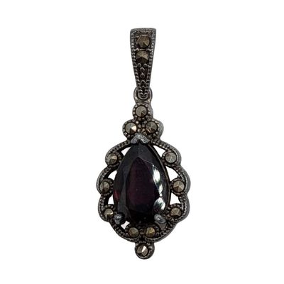 Sale Photo Thumbnail #436: Signed Sterling Silver Garnet Teardrop Marcasite Pendant