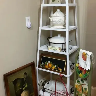 White Corner Display Shelf with Fruit Décor and Kitchen Accessories