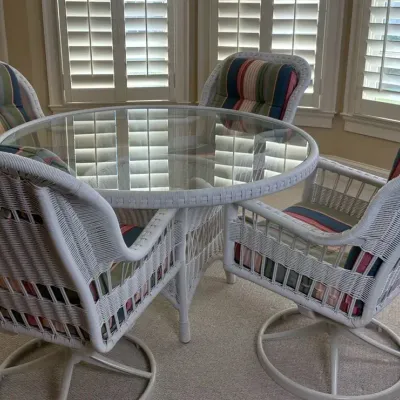 White Wicker Glass Top Table with Four Cushioned Chairs