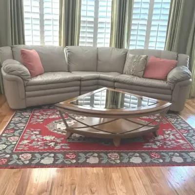 Curved Sectional Sofa, Glass Top Coffee Table and Area Rug