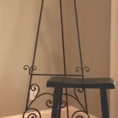Wrought Iron Display Easel and Black Wooden Stool