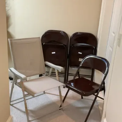 Four Metal Folding Chairs and Mesh Patio Chair