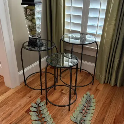 Three Glass Top Accent Tables with Decorative Accessories