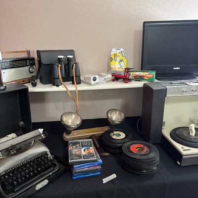 Sale Photo Thumbnail #75: Vintage Record Player, Typewriter, Radio, TV, records and more.
Large Trace Tripod