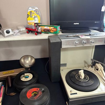 Sale Photo Thumbnail #81: Vintage Record Player, Typewriter, Radio, TV, records and more.
Large Trace Tripod