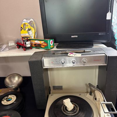 Sale Photo Thumbnail #76: Vintage Record Player, Typewriter, Radio, TV, records and more.
Large Trace Tripod