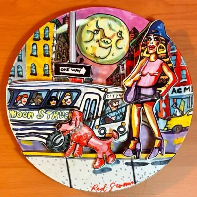 Sale Photo Thumbnail #167: Red Grooms is an American multimedia artist best known for his colorful pop-art constructions depicting frenetic scenes of modern urban life.
Measures 10 inches in diameter. #2043.
Two repaired cracks (see photo).