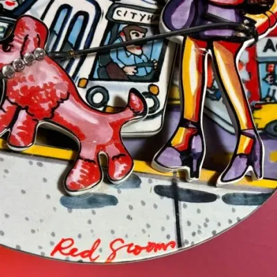 Sale Photo Thumbnail #168: Red Grooms is an American multimedia artist best known for his colorful pop-art constructions depicting frenetic scenes of modern urban life.
Measures 10 inches in diameter. #2043.
Two repaired cracks (see photo).