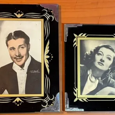Sale Photo Thumbnail #170: Myrna Loy photo measures 6 inches high and 5 inches wide (cardboard stand on back of photo is detached).
Don Ameche photo measures 8 inches high and 5 1/2 inches wide.