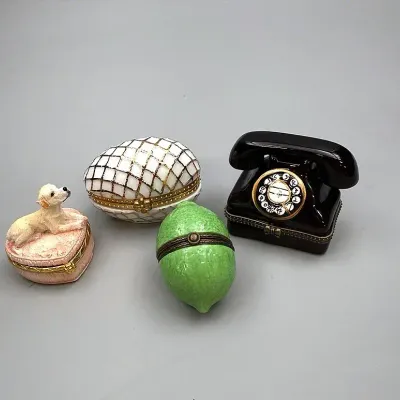 Porcelain Trinket Box Collection Including A Rotary Phone, Lime, Puppy On A Pillow & An Egg