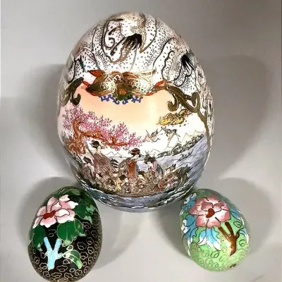 A Large Satsuma Porcelain Egg And Two Small Cloisonné Porcelain Eggs
