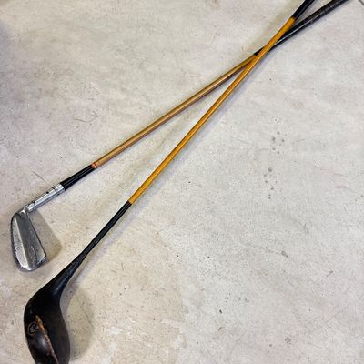 LOT 112G: Vintage Wooden Handle Golf Clubs - Higgins Model 50 & Driver