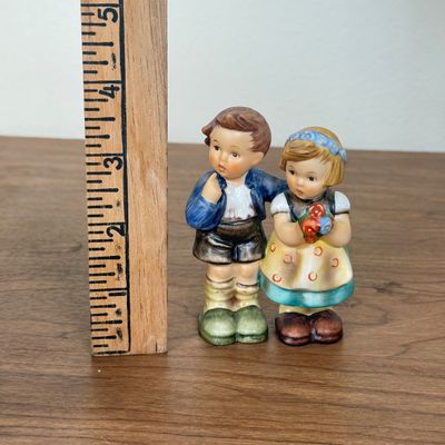 LOT 11F: Pair of Vintage Goebel Hummel Figurines w Boxes: 214/E We Congratulate & 73 Little Helper