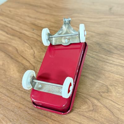 LOT 29F: Vintage 1950s Disneyland Plate, McDonald's Lion King Toy, Mini Radio Flyer & More