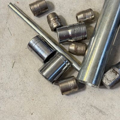 LOT 75G: Vintage Sockets, Spark Plugs & More