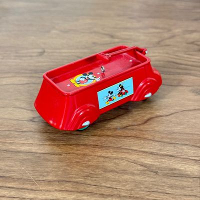 LOT 29F: Vintage 1950s Disneyland Plate, McDonald's Lion King Toy, Mini Radio Flyer & More