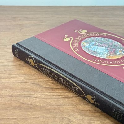 LOT 61F: Alice in Wonderland Through the Looking Glass & 1950s Honey Bunch and Norman Books