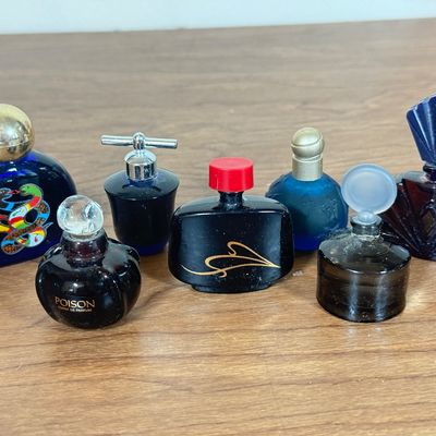 LOT 50F: Vintage Perfume Splash Bottles: Christian Dior Poison, Sun Moon and Stars & More