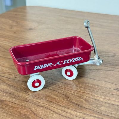LOT 29F: Vintage 1950s Disneyland Plate, McDonald's Lion King Toy, Mini Radio Flyer & More