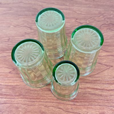 LOT 128F: Four Vintage Uranium Glasses
