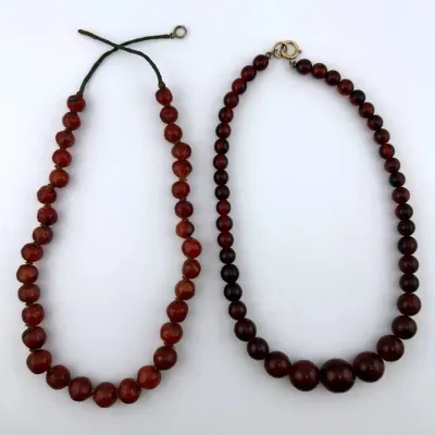 2 Red Beaded Necklaces