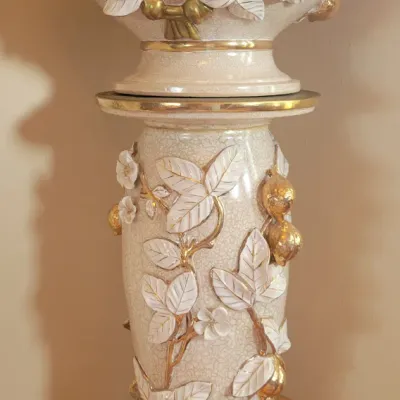 Ornate ceramic pedestal and planter set