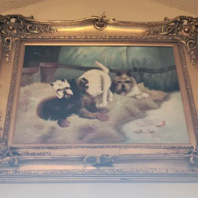 Large ornate frame with dog painting 