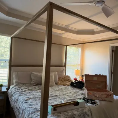 Modern king canopy bed with upholstered headboard