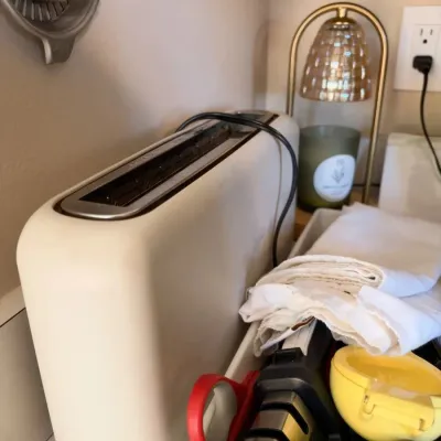 Cream 2-slice toaster, candle warmer lamp, kitchen utensils