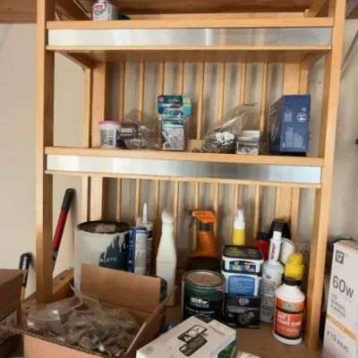 Wood garage shelf unit, hardware, paint and garage supplies