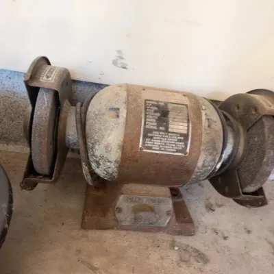 Vintage cast iron bench grinder