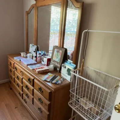 Oak triple dresser with tri-fold mirror, wire basket stand