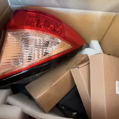 Boxed automotive tail light assembly, auto parts