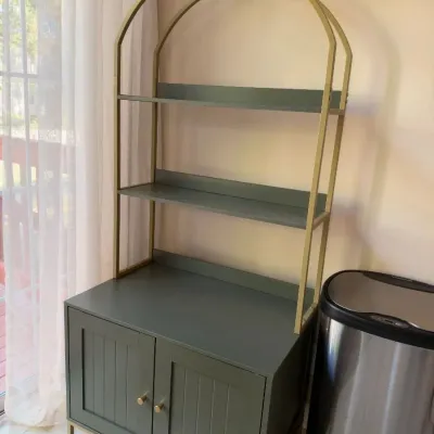Olive green arched bakers rack cabinet with gold metal frame