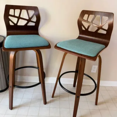 Pair of mid-century modern style bentwood swivel bar stools, teal seats