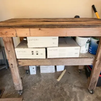 Rustic wood rolling workbench, boxes of Satori tile