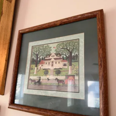 Framed Americana folk art print, horse and carriage scene