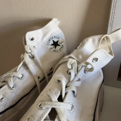 Converse Chuck Taylor All Star white high top sneakers
