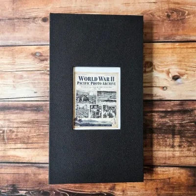 WWII Pacific photographic archive: 33 period black-and-white photographs presented in an album and offered together.