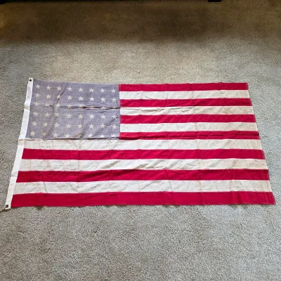 Atlas Flag Products maker’s stamp and 3 × 5-foot size marking on the vintage 48-star American flag.